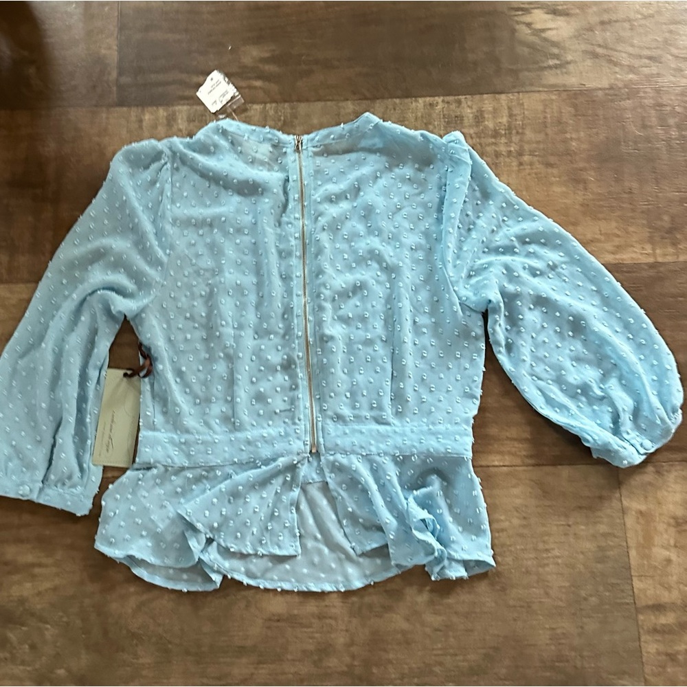 New dusty blue swiss dot peplum Zip Back top